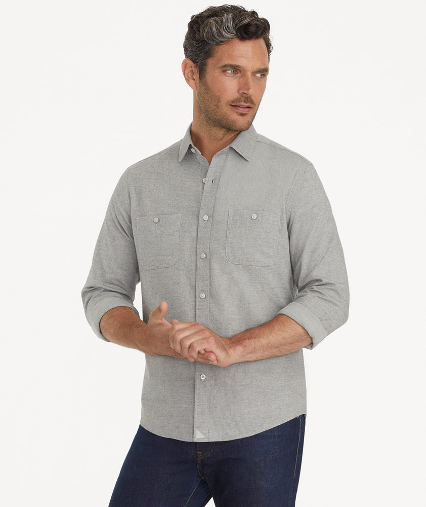 Model is wearing UNTUCKit Flannel Hemswoth Shirt in light grey.