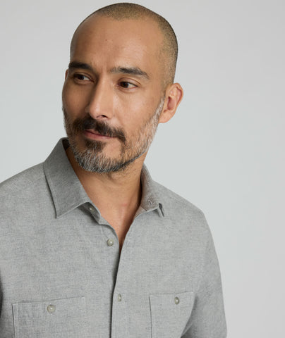 Model is wearing UNTUCKit Hemsworth in light gray.