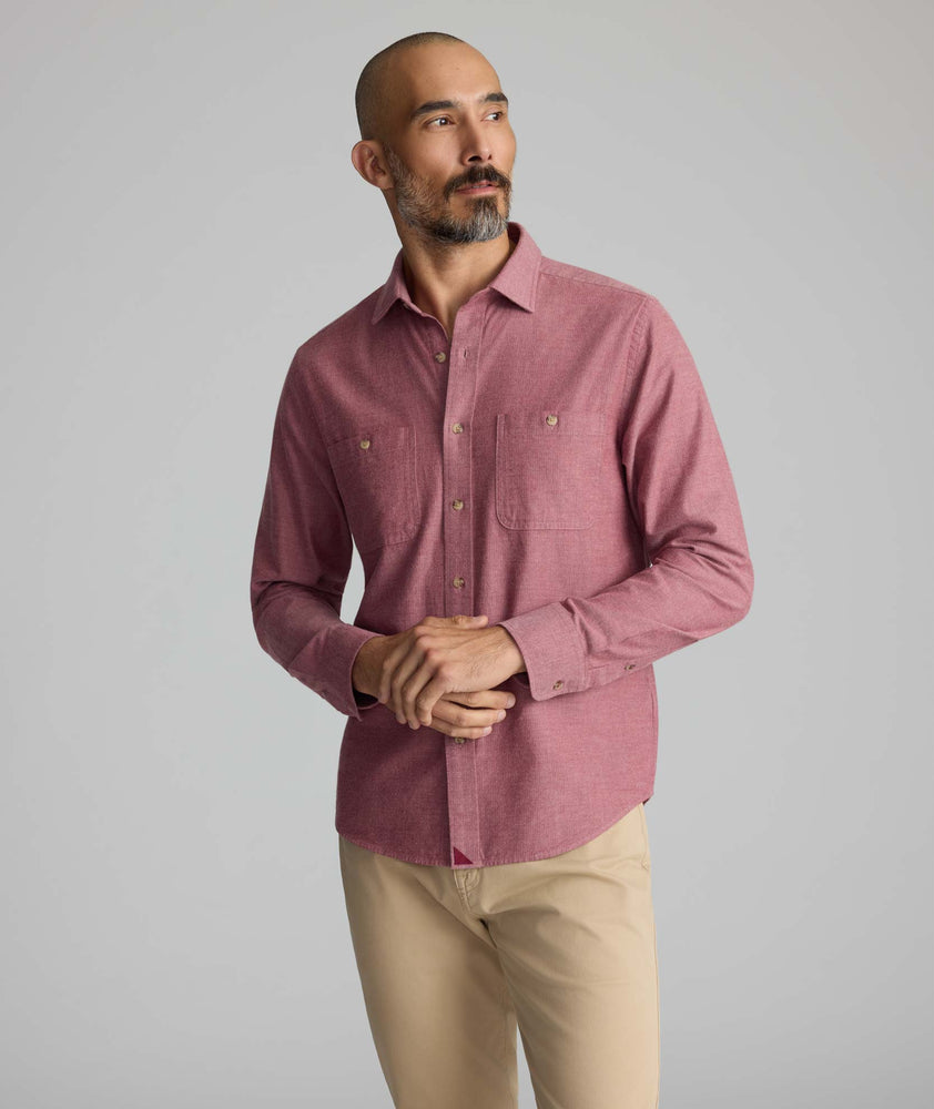Model is wearing UNTUCKit Flannel Hemsworth Shirt in Red.