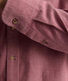 Model is wearing UNTUCKit Flannel Hemsworth Shirt in Red.