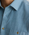 Model is wearing UNTUCKit Hemsworth in real teal.