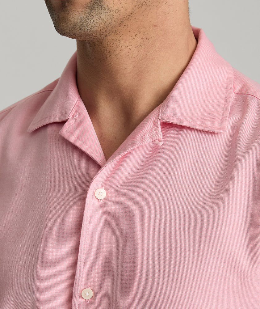 Model is wearing UNTUCKit Hughes in light red. 