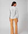 Model is wearing UNTUCKit Iris shirt in plaid grey.