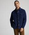 Model is wearing UNTUCKit Irvine coat in peacoat.