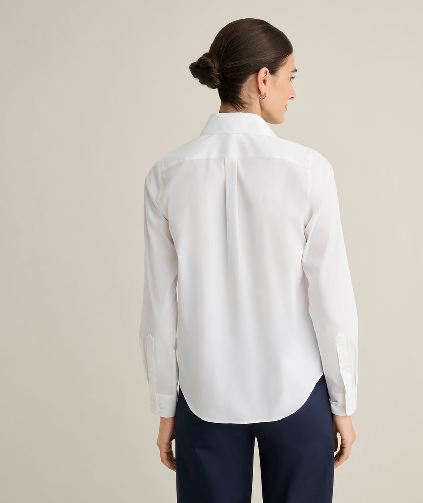 Model is wearing UNTUCKit Isabella in white. 