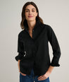Model is wearing UNTUCKit Isabella shirt in black. 