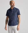Model is wearing UNTUCKit Performance Short-Sleeve Islington Shirt.