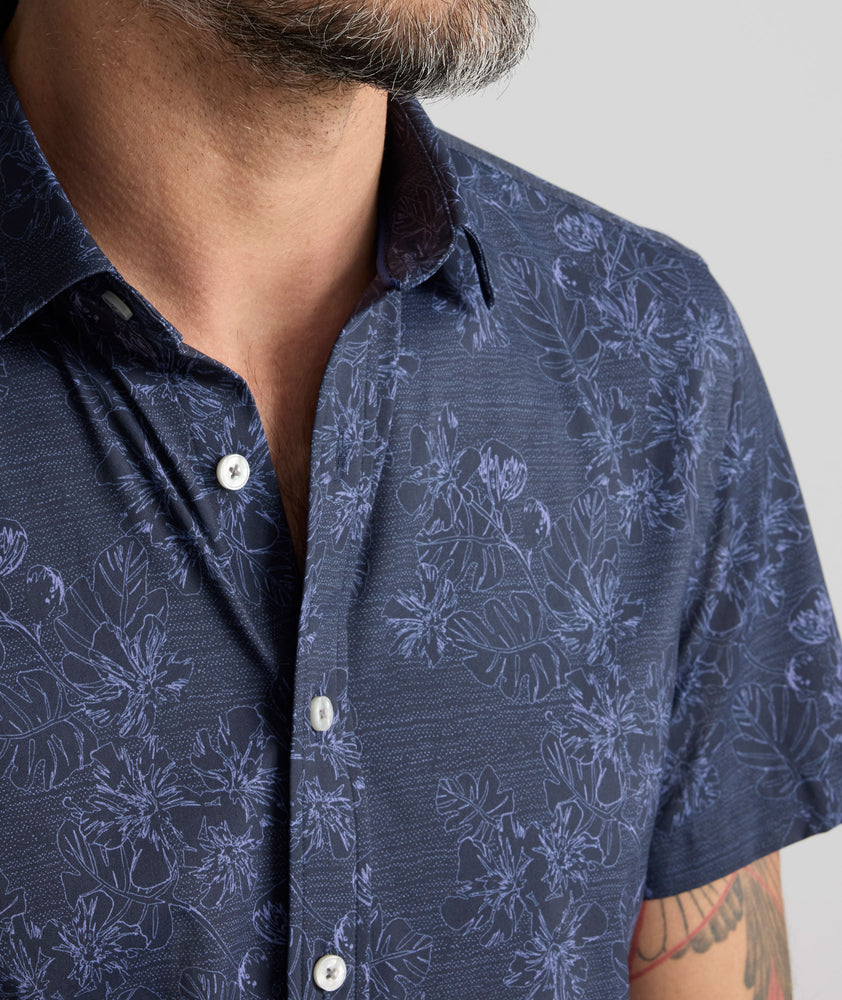 Model is wearing UNTUCKit Performance Short-Sleeve Islington Shirt.
