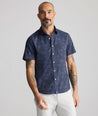 Model is wearing UNTUCKit Performance Short-Sleeve Islington Shirt.
