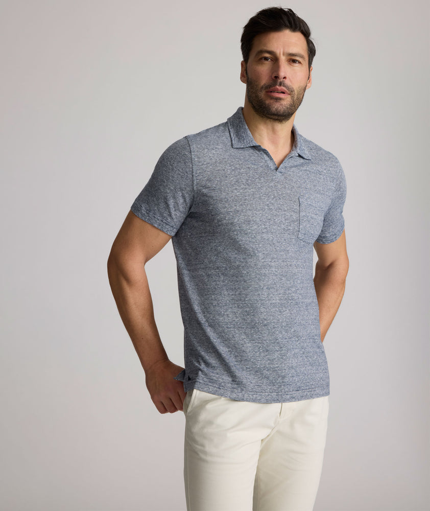 Model is wearing UNTUCKit Jacob Johnny Collar in Navy.