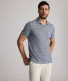 Model is wearing UNTUCKit Jacob Johnny Collar in Navy.