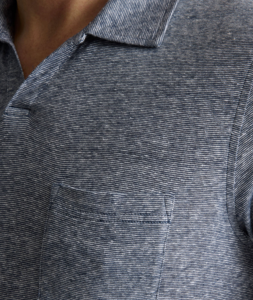Model is wearing UNTUCKit Jacob Johnny Collar in Navy.