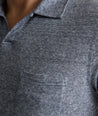 Model is wearing UNTUCKit Jacob Johnny Collar in Navy.