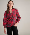 Model is wearing UNTUCKit Joy shirt in red plaid. 