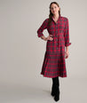 Model is wearing UNTUCKit Judy dress in plaid. 