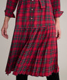 Model is wearing UNTUCKit Judy dress in plaid. 