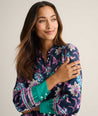 Model is wearing UNTUCKit Twill Viscose Paisley Juliet Blouse. 