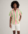 Model is wearing UNTUCKit Linen Short Sleeve Juno Shirt. 