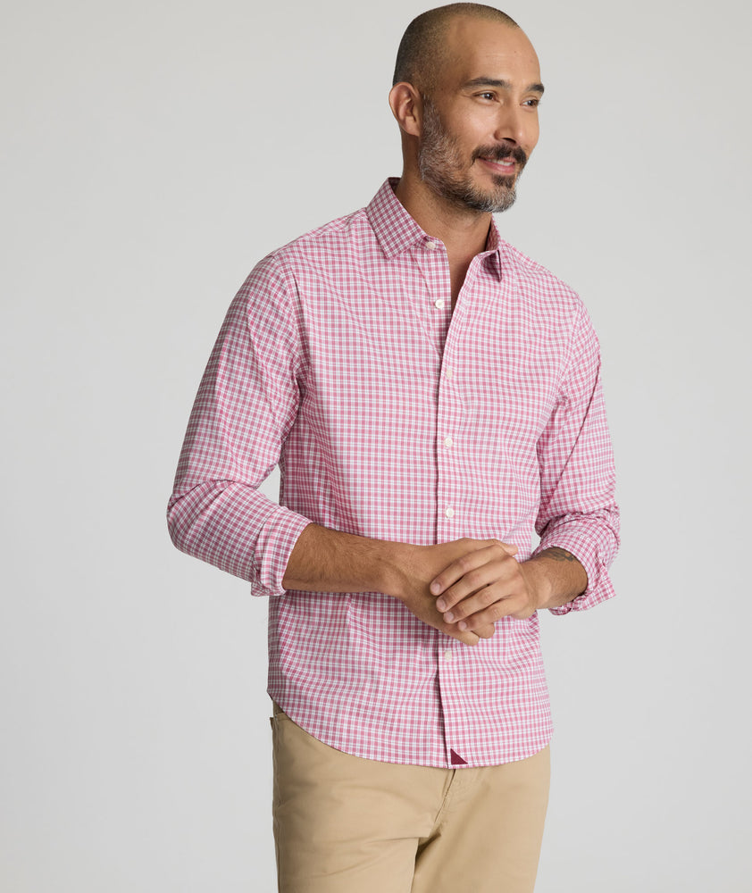 Model is wearing UNTUCKit Kaiser cottontek shirt in red.
