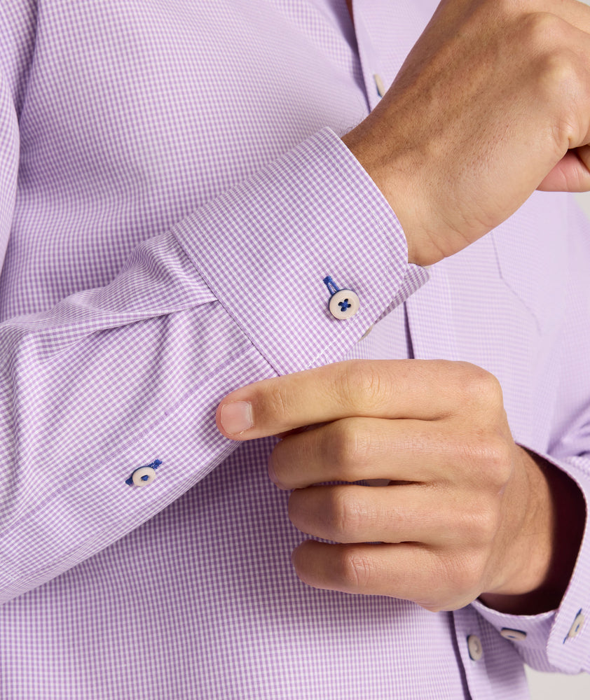 Model is wearing UNTUCKit Kelly wrinkle free shirt in purple gingham.