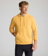 Model wearing an UNTUCKit Hoodie in yellow.