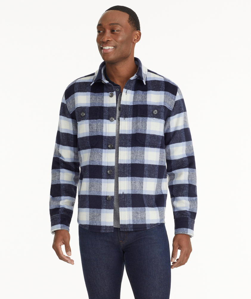 Model is wearing UNTUCKit Wool Blend C.P.O Jacket in Blue Plaid.