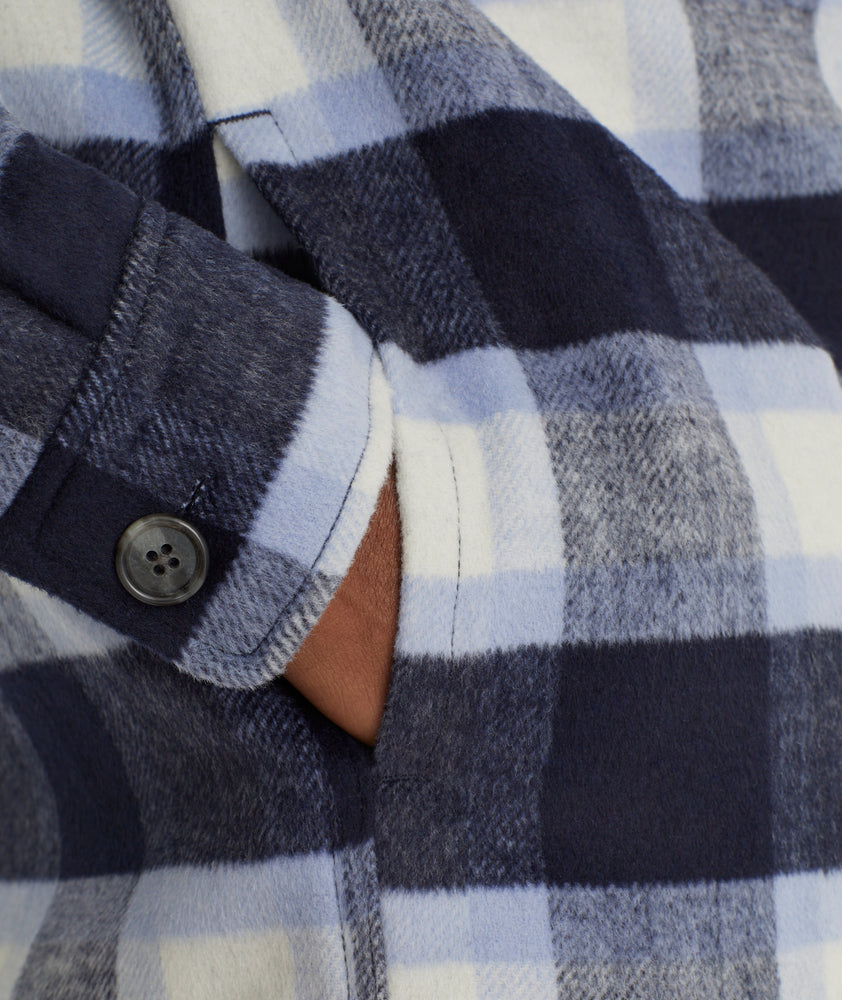 Model is wearing UNTUCKit Wool Blend C.P.O Jacket in Blue Plaid.