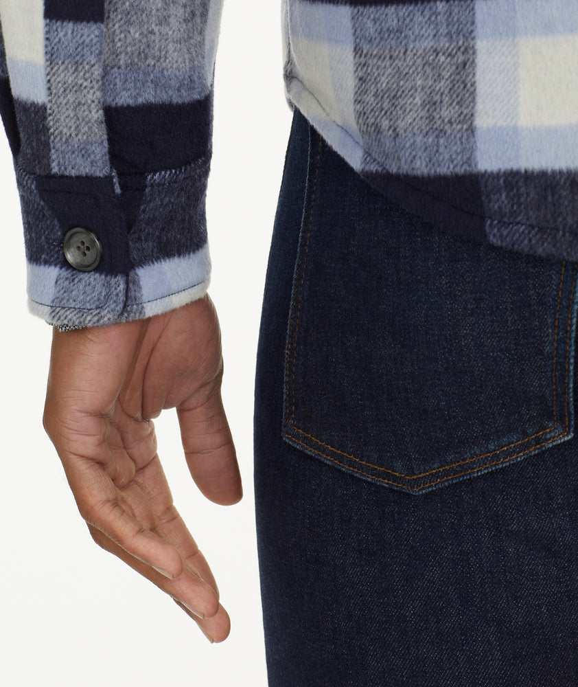Model is wearing UNTUCKit Wool Blend C.P.O Jacket in Blue Plaid.