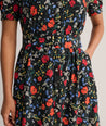 Model is wearing UNTUCKit Floral Larissa Dress.
