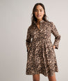 Model is wearing UNTUCKit Stretch Cotton Lauren Shirt Dress.