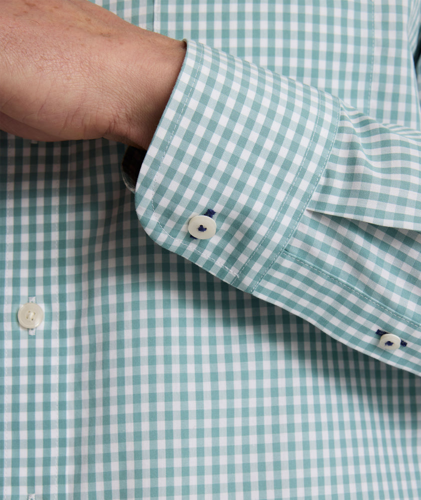 Model is wearing UNTUCKit Lawrence wrinkle-free shirt. 