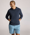 Model is wearing UNTUCKit Lazio Hoodie in Peacoat.