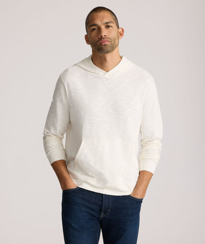 Model is wearing UNTUCKit Slub Cotton Hoodie in Off-White egret.