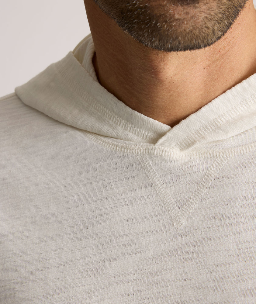 Model is wearing UNTUCKit Slub Cotton Hoodie in Off-White egret.