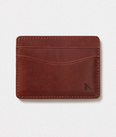 UNTUCKit leather card case in brown.