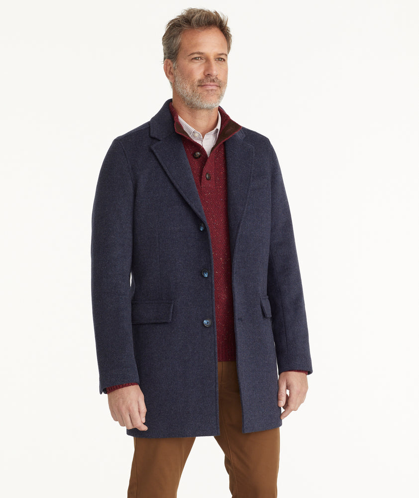 Model is wearing UNTUCKit Wool Blend Topcoat.