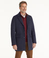 Model is wearing UNTUCKit Wool Blend Topcoat.