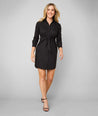 Model is wearing UNTUCKit Lisa dress in black.