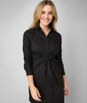 Model is wearing UNTUCKit Lisa dress in black.