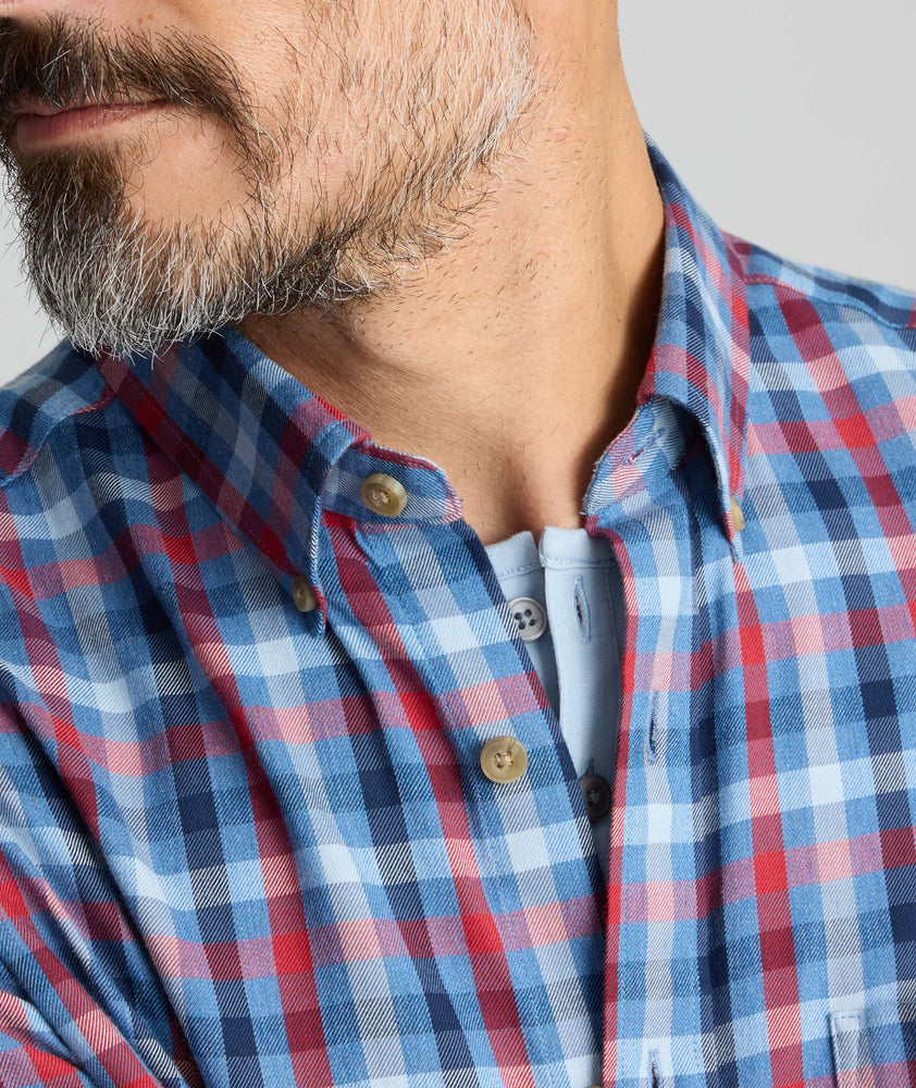 Model is wearing UNTUCKit Ultrasoft Flannel Shirt in Blue Plaid. 