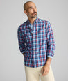 Model is wearing UNTUCKit Ultrasoft Flannel Shirt in Blue Plaid. 