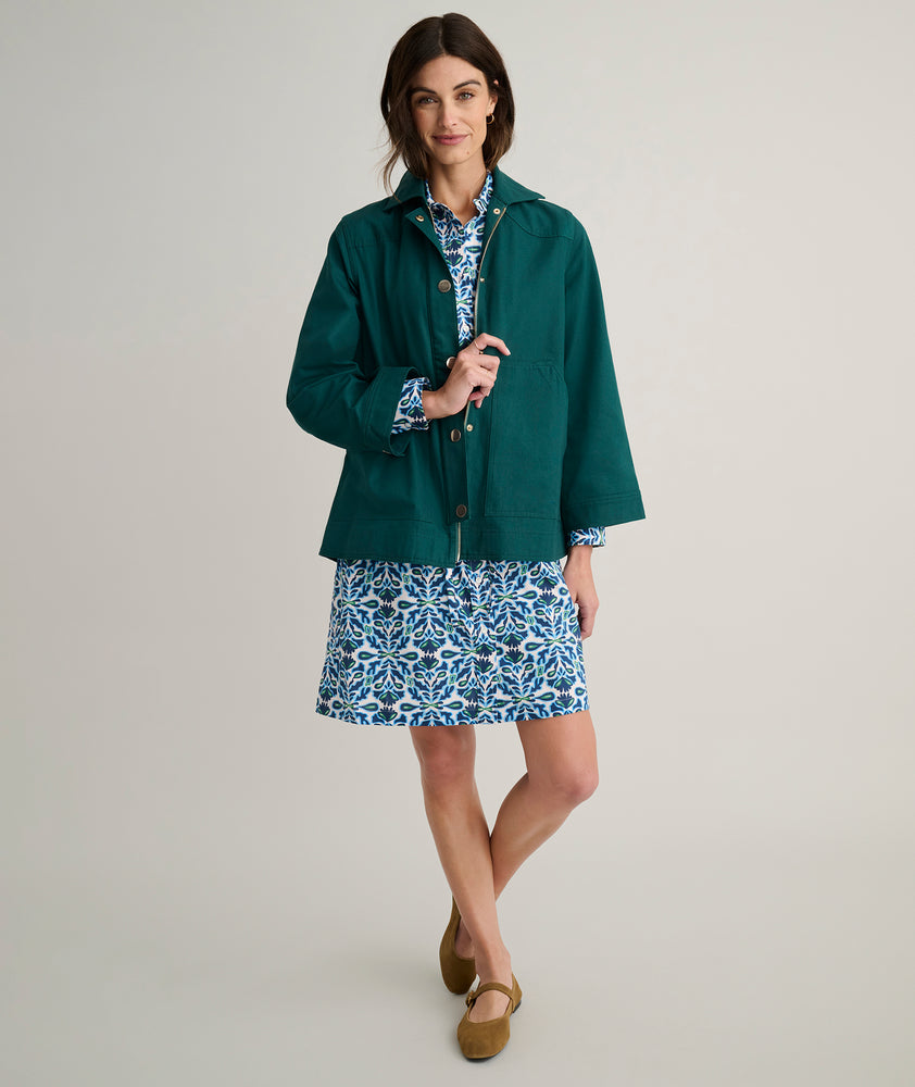 Model is wearing UNTUCKit Logan jacket in green. 