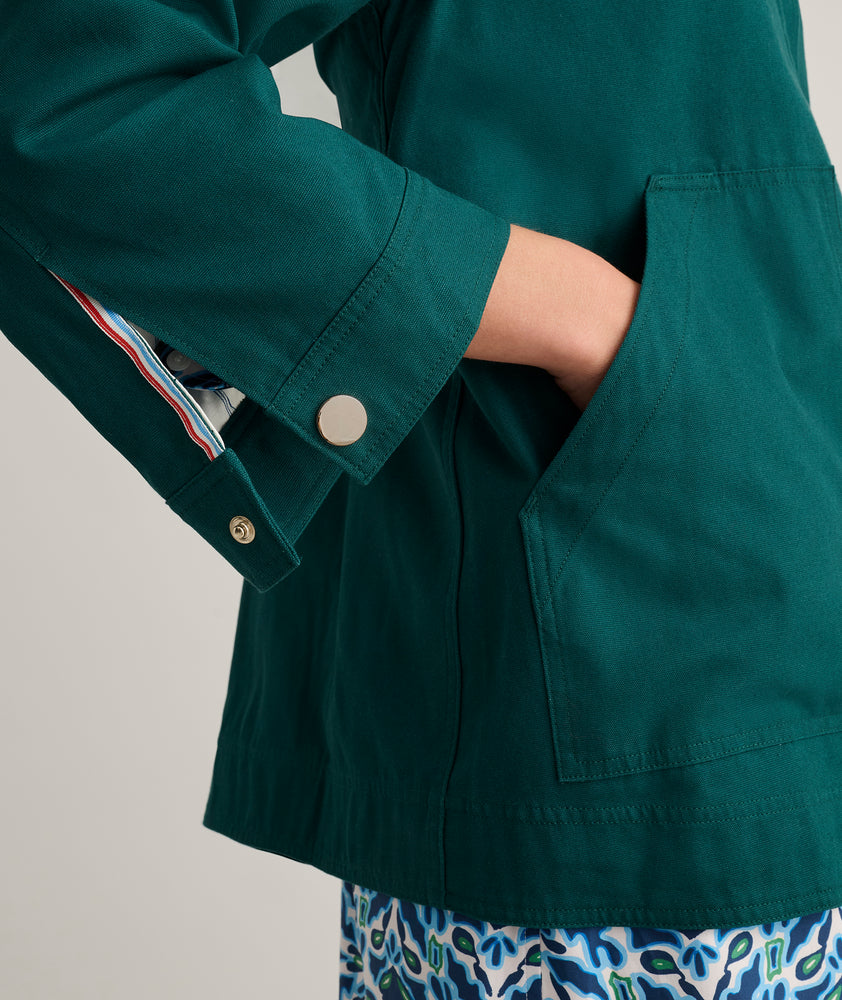Model is wearing UNTUCKit Logan jacket in green. 