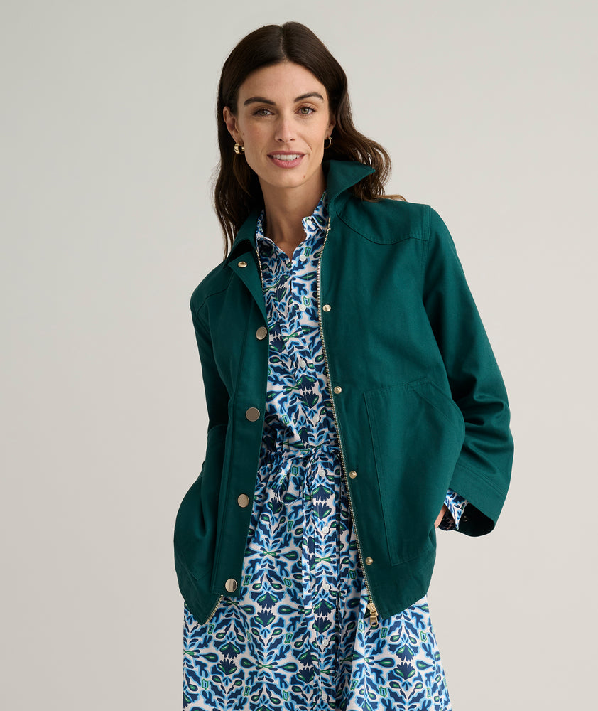 Model is wearing UNTUCKit Logan jacket in green. 
