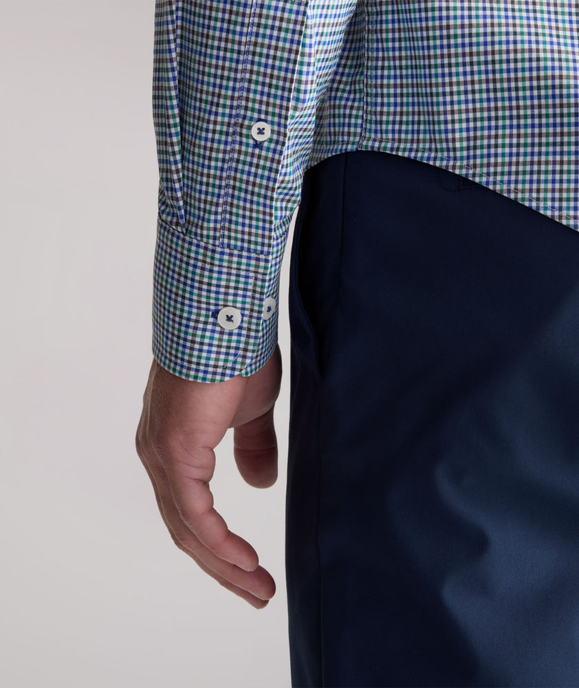 Model is wearing UNTUCKit Performance Lorimar Shirt in blue. 