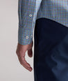 Model is wearing UNTUCKit Performance Lorimar Shirt in blue. 