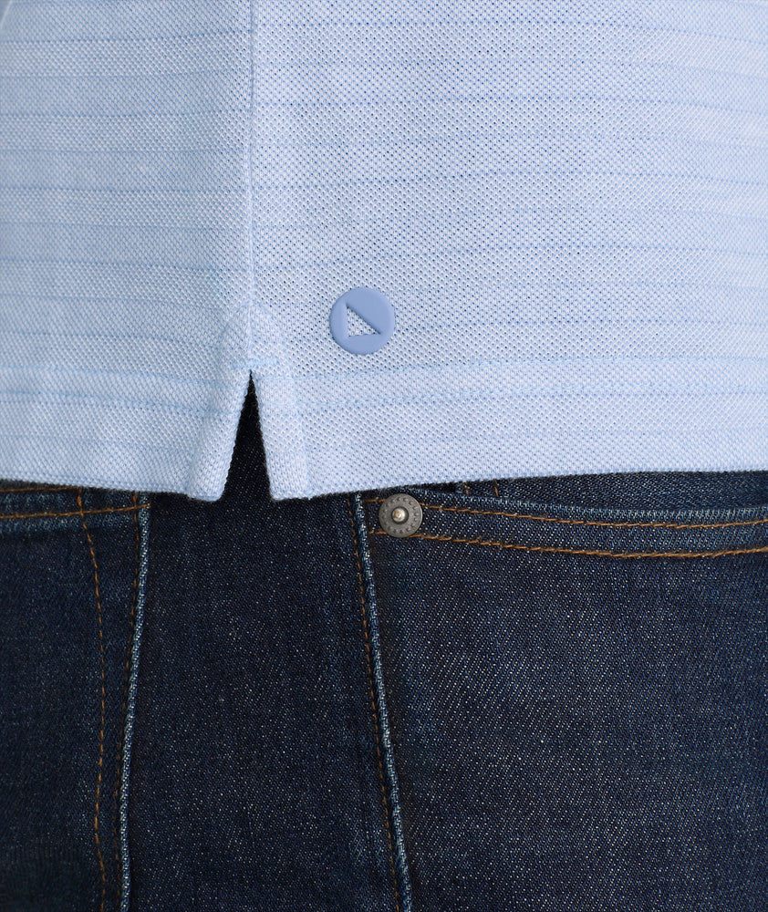 Model is wearing UNTUCKit Lucca polo in eventide.