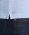 Model is wearing UNTUCKit Lucca polo in eventide.