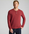 Model is wearing UNTUCKit Marastina henley in Chili Oil.