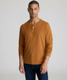 Model is wearing UNTUCKit Marastina LS Tencel Henley in Roasted Pecan.